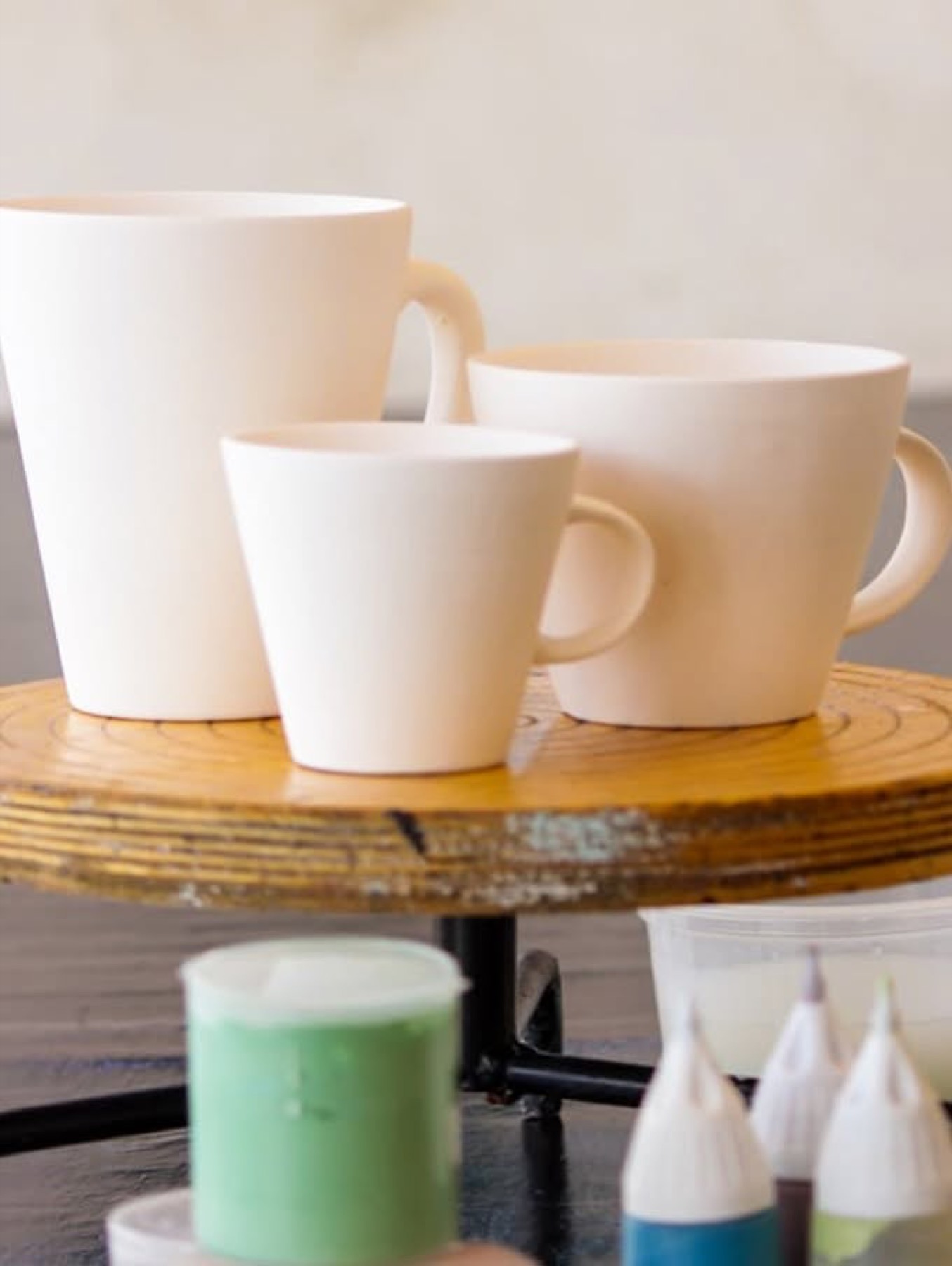 Blank ceramic mugs ready to be painted