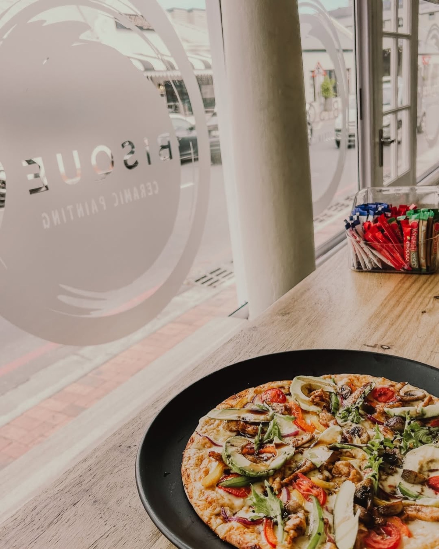 Pizza served at Bisque It